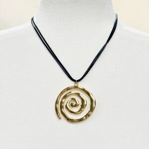 Gold spiral pendant necklace with adjustable black cord